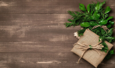 Elegant Rustic Gift Wrapping with Greenery on Wooden Background for Holiday or Seasonal Celebrations, Perfect for Eco-Friendly Themes and Decorations
