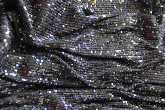 Tela negra con chaquira color negro brillante