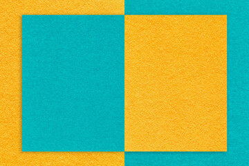 Fototapeta premium Texture yellow and turquoise paper background with geometric shape, macro. Structure craft cerulean cardboard