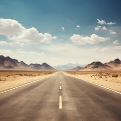 Fototapeta premium A long road with a clear blue sky above it