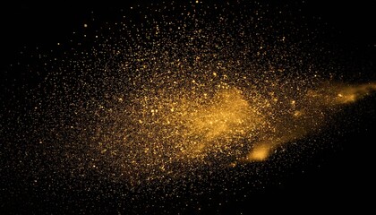 Fototapeta premium Gold dust sparkles in the dark creating a stunning visual effect in the air