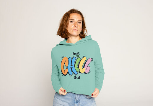 Young Woman With Red Hair and Freckles Posing in Sweater. PSD mockup ready to insert your design and change the color