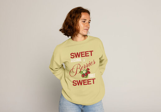 Young Redhead Woman in a Sweater Poses for a Casual Portrait. PSD mockup ready to insert your design and change the color