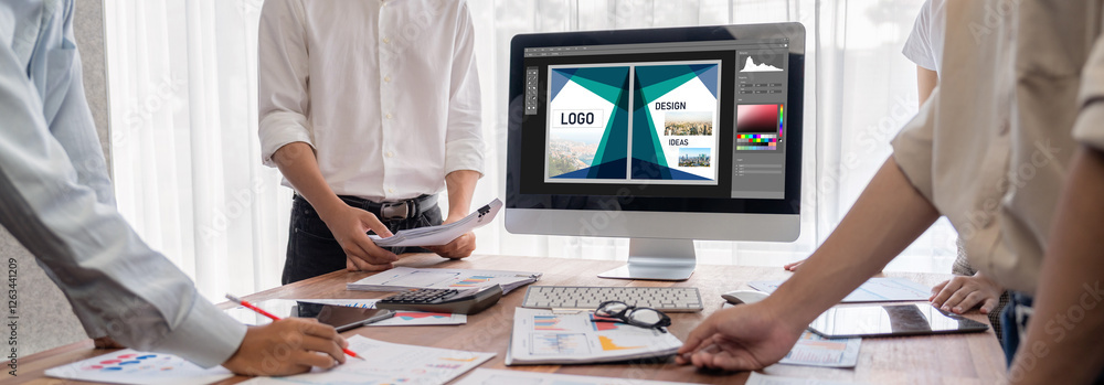 Poster Graphic designer software for modern design of web page and commercial brisk ads showing on the computer screen