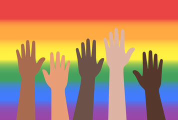 Raised hands with different skin color against the background of the rainbow flag - multiculturalism and diversity.