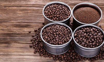 Diverse Selection of Raw Coffee Beans and Seeds in Metal Containers Arranged on Rustic Wooden Table Background for Food and Beverage Themes