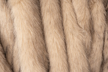 Texture of faux fur as a background, top view.