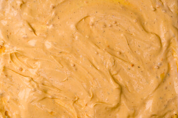 Yellow sauce splashes as a background.
