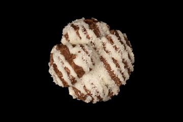 Profiteroles with coconut cream on a black background.