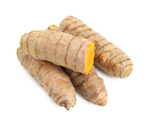 Whole and cut turmeric roots isolated on white