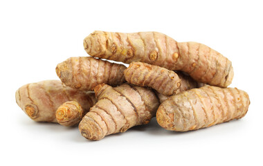 Pile of fresh turmeric roots isolated on white
