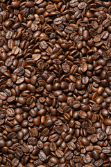 Fototapeta premium Roasted coffee beans close up texture pattern