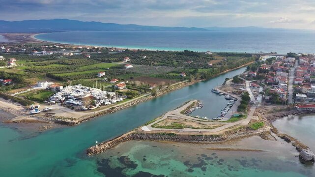 Aerial view at Nea Potidea canal, which connects Toroneos Bay with the Gulf of Thermaikos. Greece, Kassandra, Halkidiki