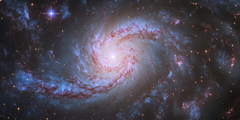 A mesmerizing spiral galaxy in shades of deep blue and violet, its arms stretching into the void, surrounded by glowing interstellar dust.