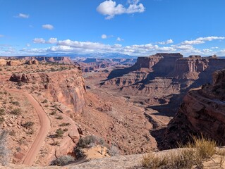 Canyonlands with snow covered mountains in the background