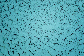 Melting snow on glass