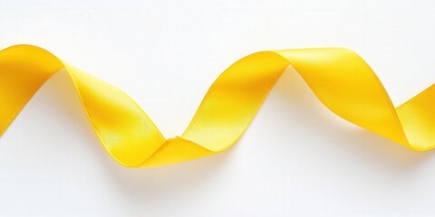 Glossy yellow ribbon curves gracefully over a pristine white backdrop, its delicate strips catching the light with vibrant elegance