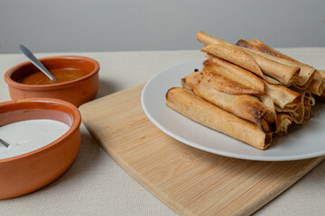 Golden tacos ready to be filled with delicious ingredients