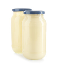 Tasty mayonnaise sauce in glass jars isolated on white