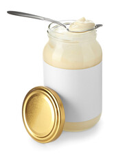Tasty mayonnaise sauce in glass jar with blank label and spoon isolated on white