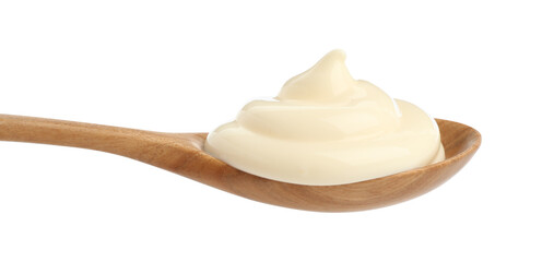 Tasty mayonnaise sauce in wooden spoon isolated on white