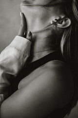 hand on woman's neck