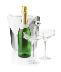 Bottle of champagne, empty glasses and ice bucket isolated on white