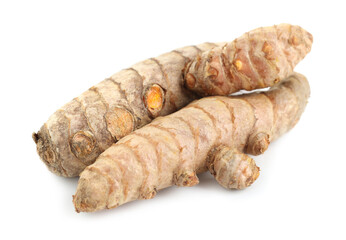 Two fresh turmeric roots isolated on white