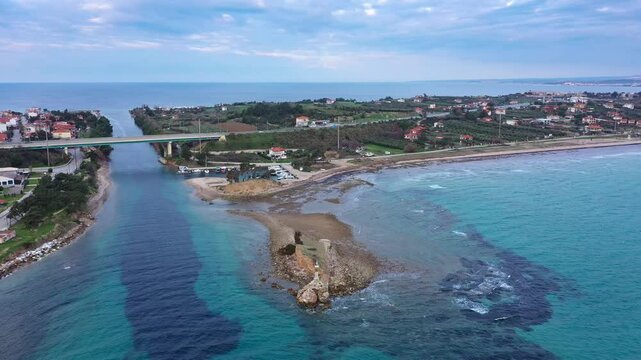 Aerial view at Nea Potidea canal, which connects Toroneos Bay with the Gulf of Thermaikos. Greece, Kassandra, Halkidiki