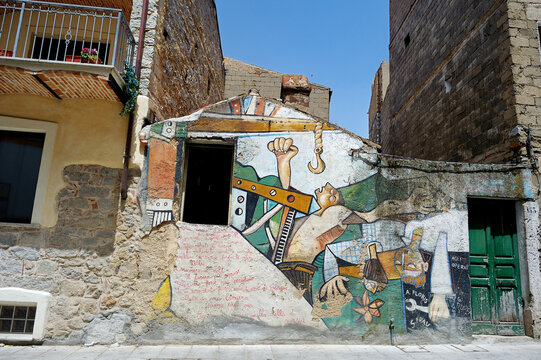 ORGOSOLO, ITALY - MAY 21, 2014: Wall paintings