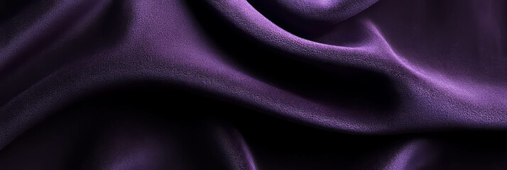 Obraz premium Deep violet suede fabric with subtle sheen draped elegantly for use in a stylish banner
