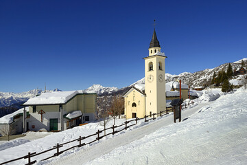 Church in the center of the village in winter. The village lies in the valley leading to the...