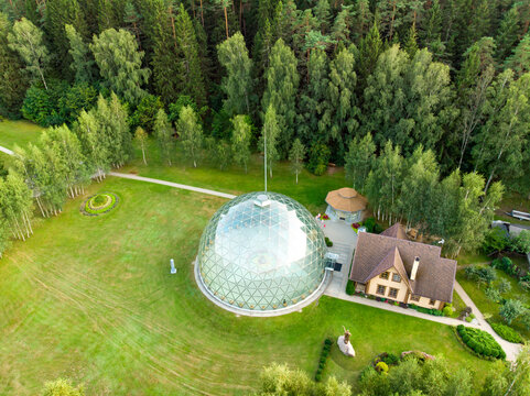 MERKINE, LITHUANIA - AUGUST 16, 2018: Merkine Pyramid, protected by a glass dome, famous for healing and spiritual uplifting.