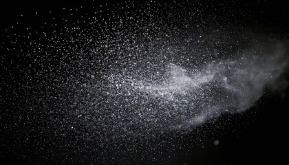 Obraz premium Sparkling particles create a stunning cosmic effect against a dark background