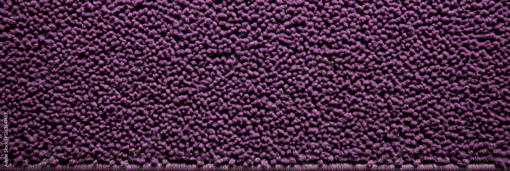 Poster deep purple dense cut and loop carpet with varied pile height and subtle shadows