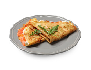 Delicious crepes with salmon, cream cheese and arugula isolated on white