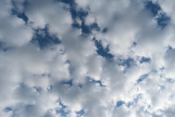 Stratocumulus clouds covered blue sky, natural cloudscape