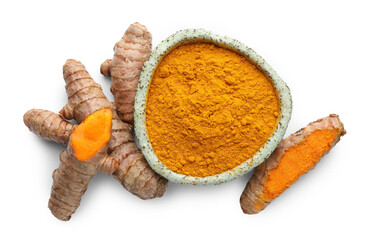 Turmeric powder in bowl and roots isolated on white, top view