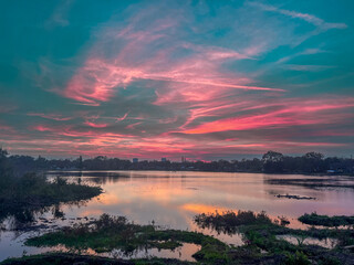 Lake Sunset With Blue Pink Yellow Orange Sky, Green Grass