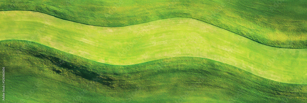 Aufkleber landscape showcasing a light green fairway with distinct mowing patterns and smooth texture