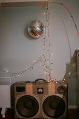 Mirror ball and retro speaker at party