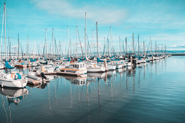 A large number of boats are docked in a marina