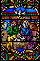 Stained glass (19th century) of Christmas Nativity Scene with Virgin Mary, Saint Joseph, and Jesus...