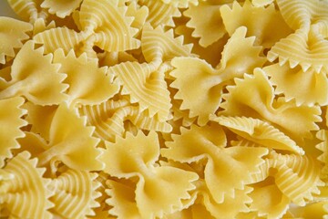 Background with pasta, pasta bows isolated 