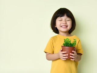 Smiling Toddler Holding Potted Plant, Promoting Sustainability and Green Living
