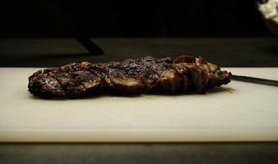 Freshly cooked steak, sliced into juicy pieces with a perfect sear. Tender, flavorful, and mouthwatering—ideal for culinary and food projects!