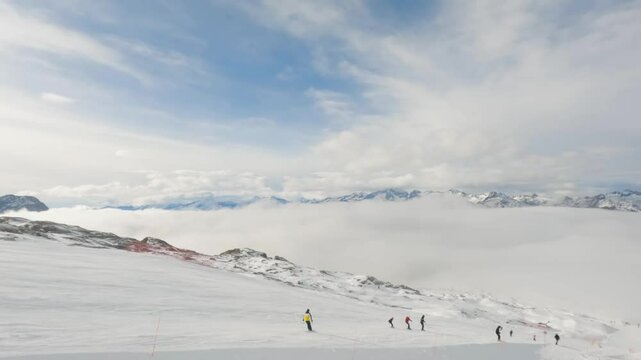 View from chair lift in Madonna di Campiglio ski resort above the clouds
