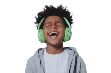 Excited African American boy with green headphones laughing joyfully on transparent background Concept of happiness, music, and childhood fun