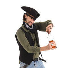 Young pirate opening bottle of rum on white background