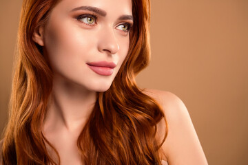 Fototapeta premium Photo of attractive stunning woman look empty space model shoulders off isolated on beige color background